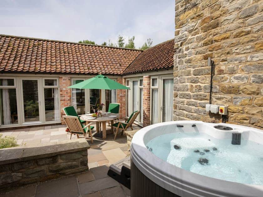 Patio area with hot tub | Willow Cottage, Harwood Dale, near Scarborough
