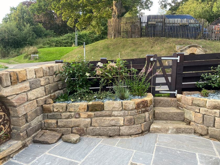 Charming patio garden | Fern Cottage, Lealholm, near Whitby