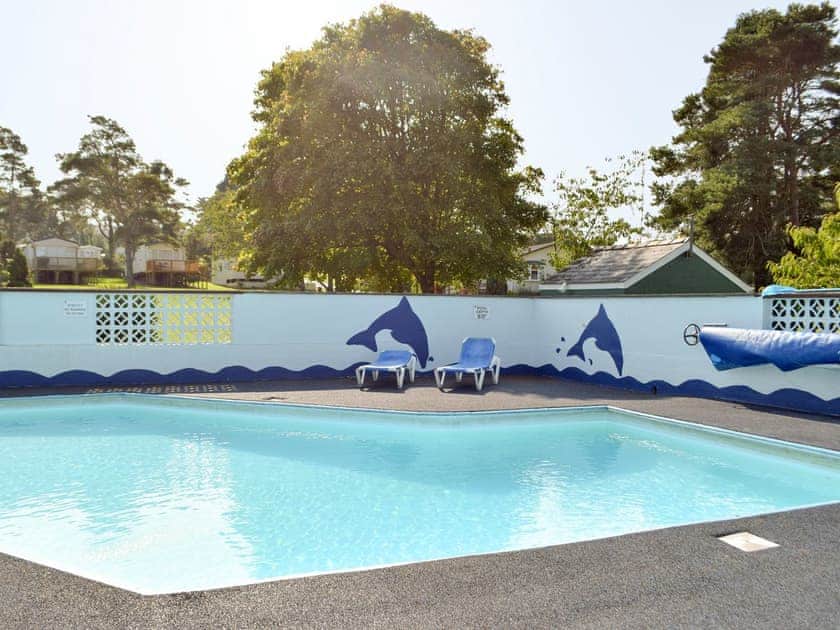 On-site swimming pool | Tranquillity, Sea View - Dinas Country Club, Dinas, near Fishguard
