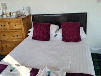 Bedroom | The Wild Cat - Black Isle Holiday Apartments, Avoch