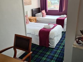 Bedroom | The Wild Cat - Black Isle Holiday Apartments, Avoch