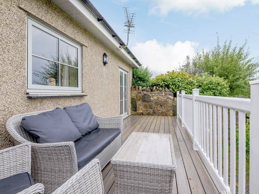 Sitting-out-area | Ysgubor - Rhyddallt Ganol Cottages, Caethro, near Caernarfon