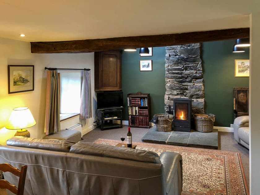 Warm and welcoming living room with wood burner | Little Knott, Blawith, near Coniston