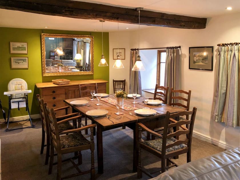 Dining area with large rustic dining table | Little Knott, Blawith, near Coniston