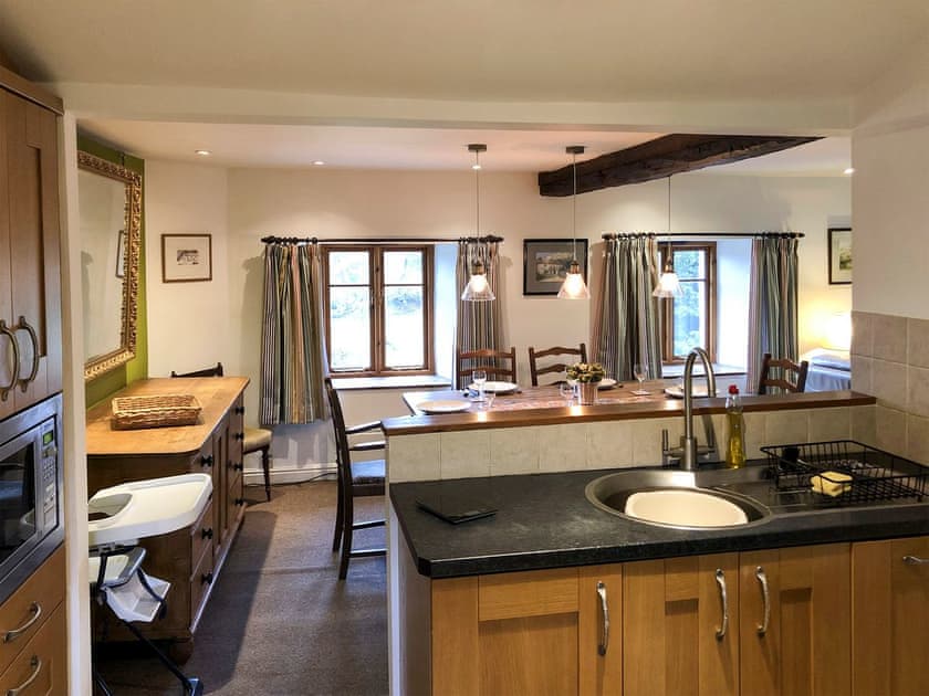 Splendid kitchen overlooking the dining area | Little Knott, Blawith, near Coniston