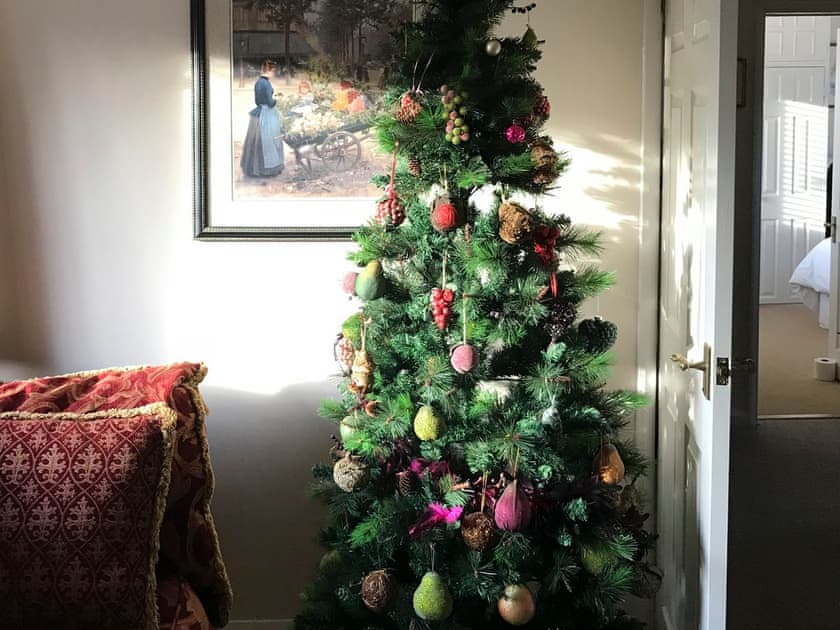Living area with festive decoration | Alderley House, Bourton-on-the-Water