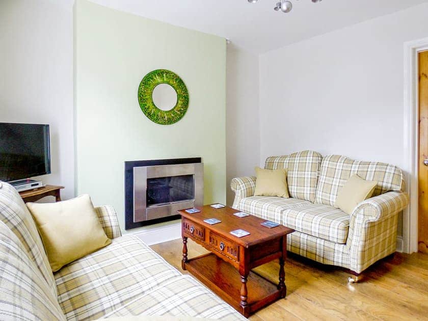 Pretty living area with comfortable sofas | Ferndene Cottage, Hinderwell, near Whitby
