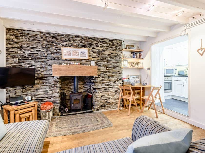 Welcoming living area with wood burner | Pebble Cottage - Aberlovely Holidays, Aberdovey