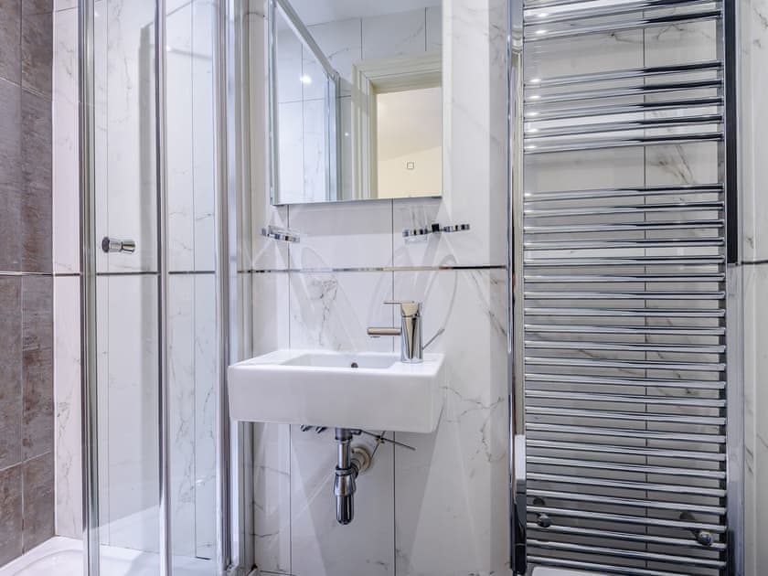 En-suite shower room with heated towel rail | Apartment 1, Aberdovey