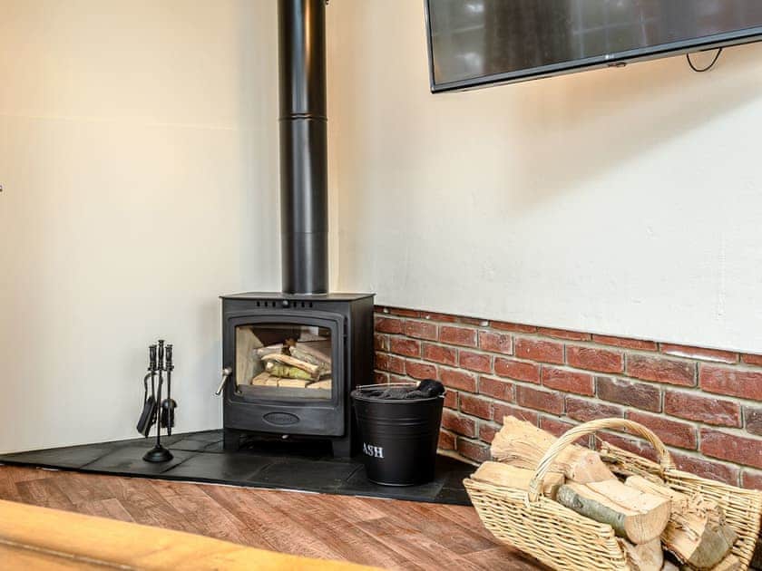 Warming wood burner | White Oak Cottage, Hagworthingham, near Horncastle
