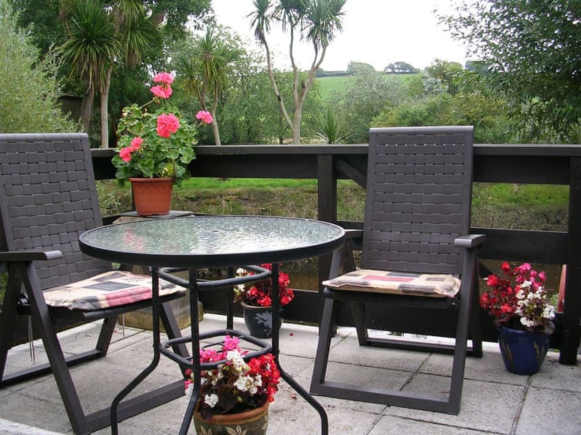 Patio area with outdoor furniture | Mill Cottage, Aveton Gifford, near Kingsbridge