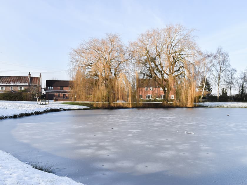 Picturesque Tolthorpe village green in the snow
