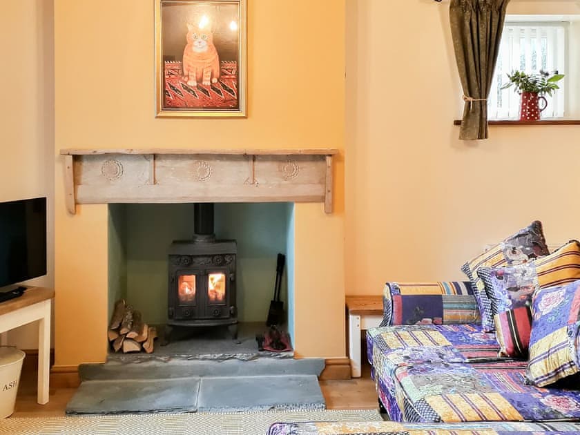 Cheerfully decorated open plan living space | Skelmorlie Cottage, Portinscale, near Keswick