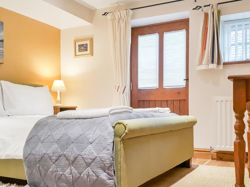 Relaxing double bedroom | Skelmorlie Cottage, Portinscale, near Keswick