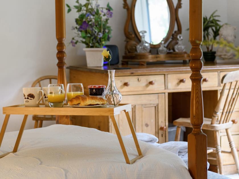 Four Poster bedroom | Treetops, Arthog, near Dolgellau