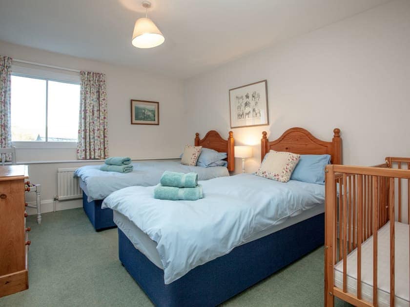 Twin bedroom with cot | Tuckenhay Mill House - Tuckenhay Mill, Bow Creek, between Dartmouth and Totnes
