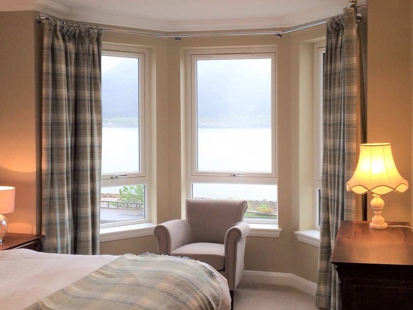 Cosy bedroom with delightful loch views | Apartment 1 - Allt-Nan-Ros Apartments, Onich, near Fort William