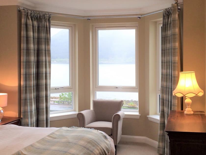 Cosy bedroom with delightful loch views | Apartment 3 - Allt-Nan-Ros Apartments, Onich, near Fort William
