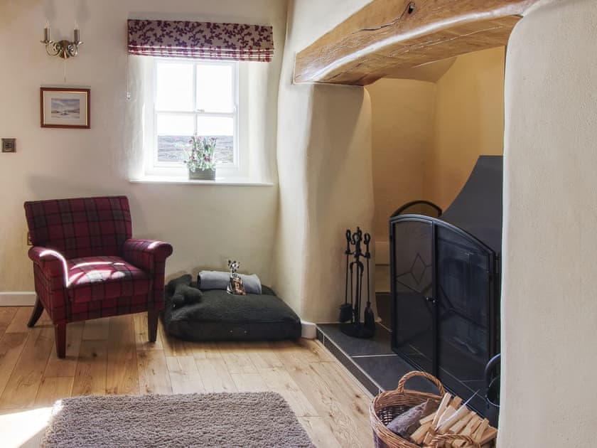Charming living and dining room | Fferam Gorniog, Holyhead Mountain, near Trearddur Bay