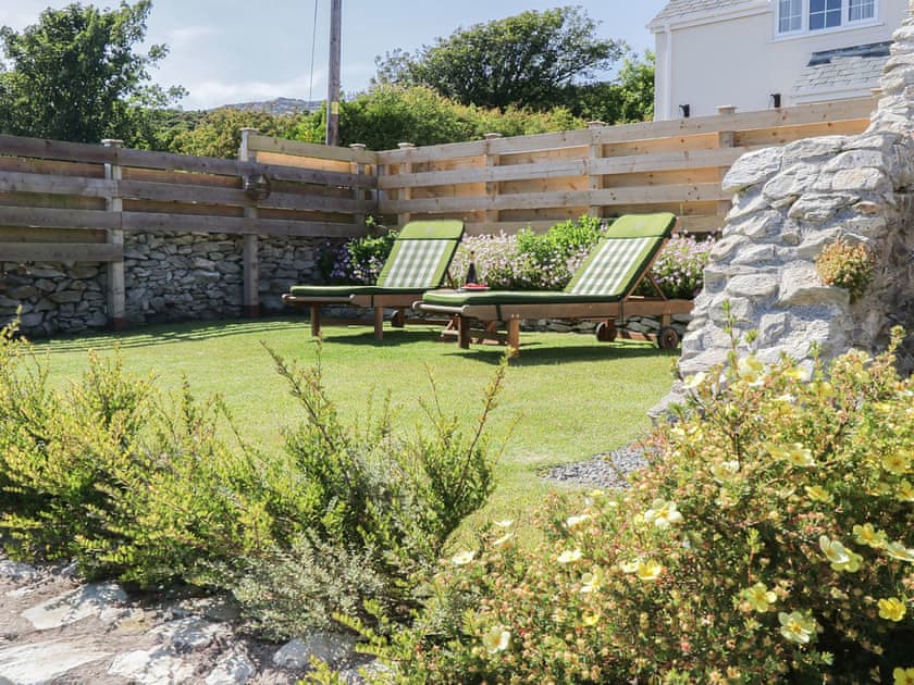 Top terrace sitting out area | Fferam Gorniog, Holyhead Mountain, near Trearddur Bay