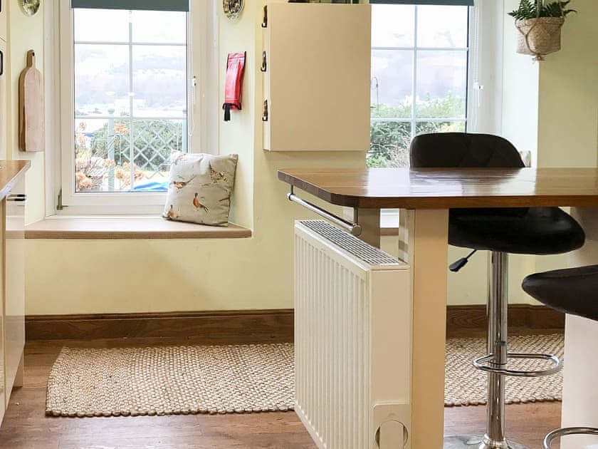 Kitchen breakfast bar with view across to Castle | Croftbank, Lochranza