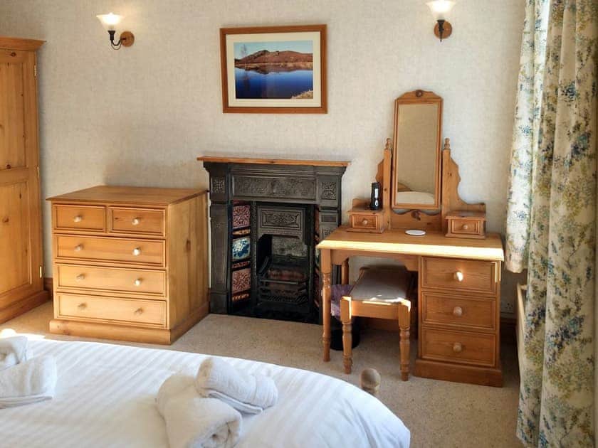 Ample storage and dressing area within double bedroom | Glenmore Cottage, Ambleside