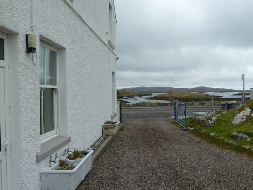 Outdoor area | Sunrise Apartment, Lochmaddy