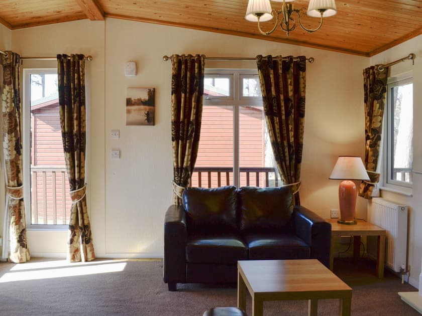 Living area | Lodge F - Royal Deeside Woodland Lodges, Dinnet, near Ballater