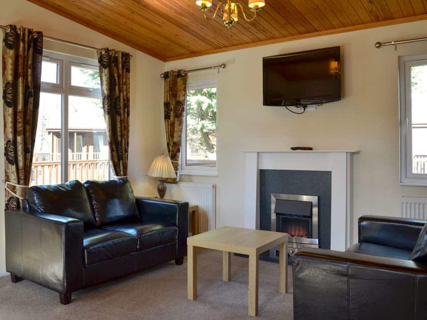 Living area | Lodge G - Royal Deeside Woodland Lodges, Dinnet, near Ballater