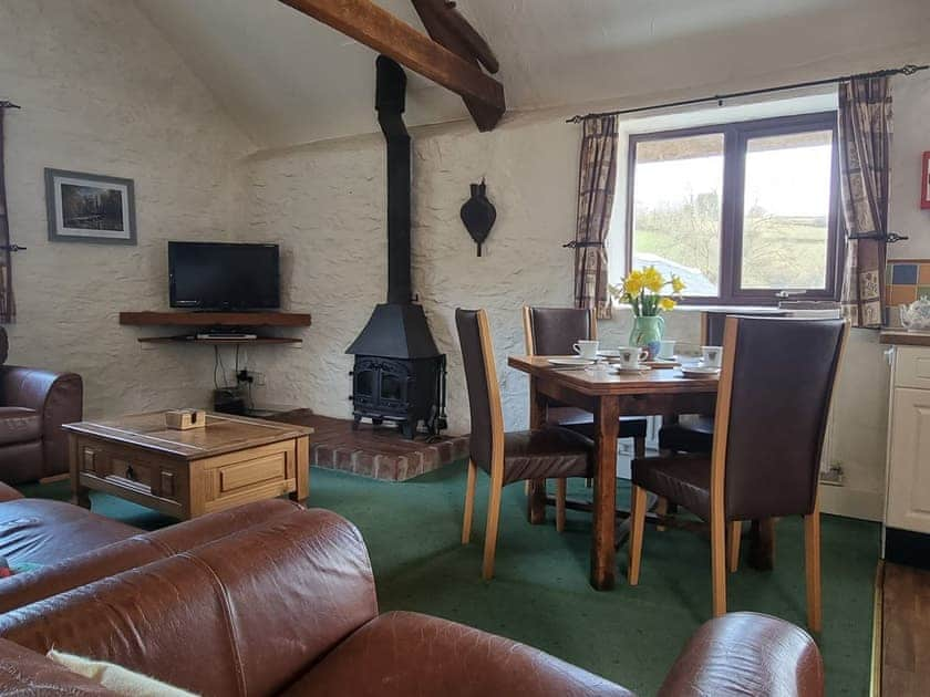 Open plan living space | Heather Cottage - Riscombe Farm Cottages, Exford