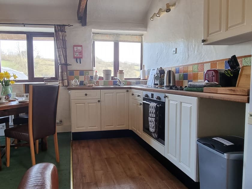 Open plan living space | Heather Cottage - Riscombe Farm Cottages, Exford