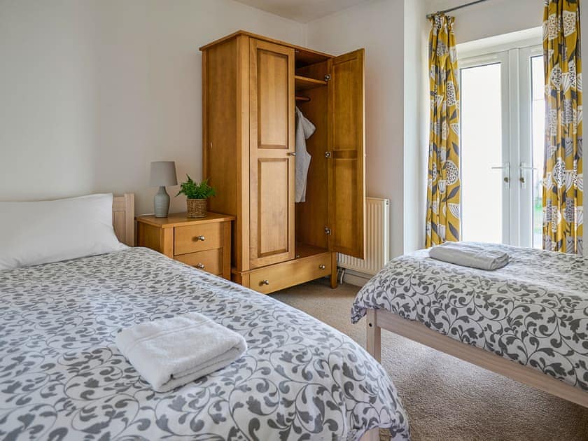 Master bedroom | The Mill - Bach Wen Cottages, Clynnog Fawr