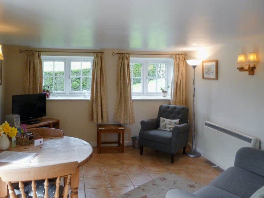 Welcoming living and dining area | Wren Cottage, Salwayash, near Bridport