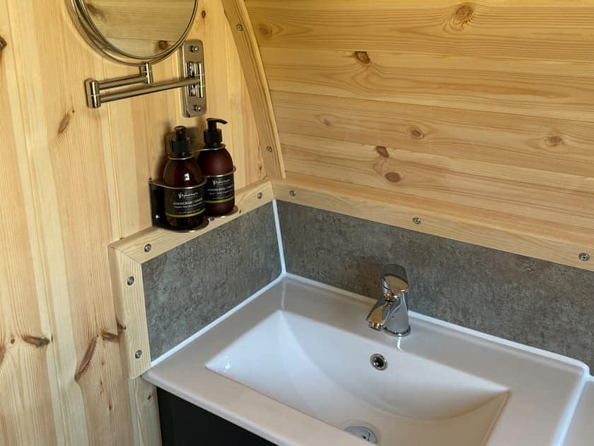 Modest washing facilities in the shower room | Maggie’s Cabin, Oban