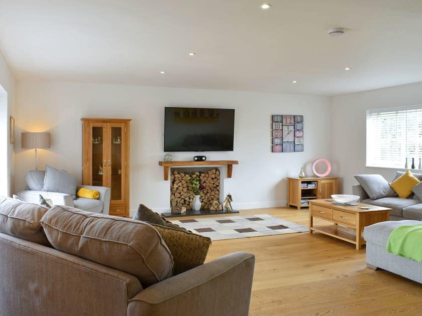 Living room | Groves Cottage - Devonia Holiday Homes, Newchurch, near Sandown