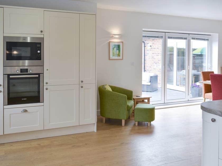 Kitchen/diner | Groves Cottage - Devonia Holiday Homes, Newchurch, near Sandown