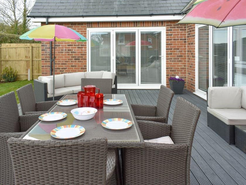 Outdoor area | Groves Cottage - Devonia Holiday Homes, Newchurch, near Sandown