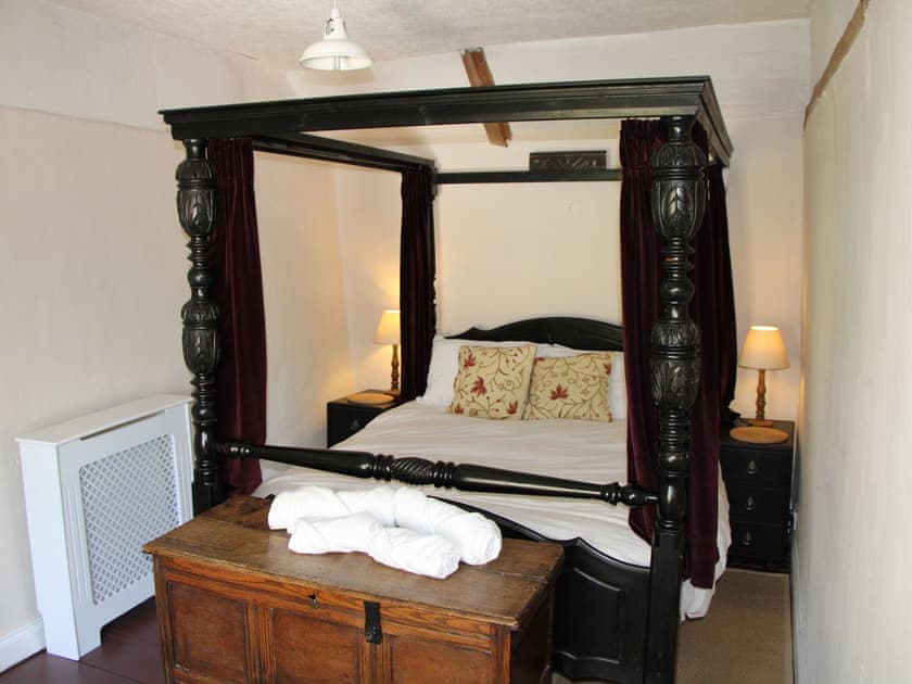 Four Poster bedroom | Lavender Cottage, Methwold, near Thetford