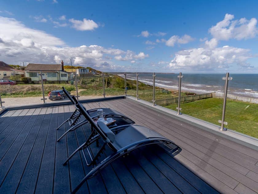 Terrace | Apple Pip - Beach House & Bay View Cottages, Reighton Gap, near Filey