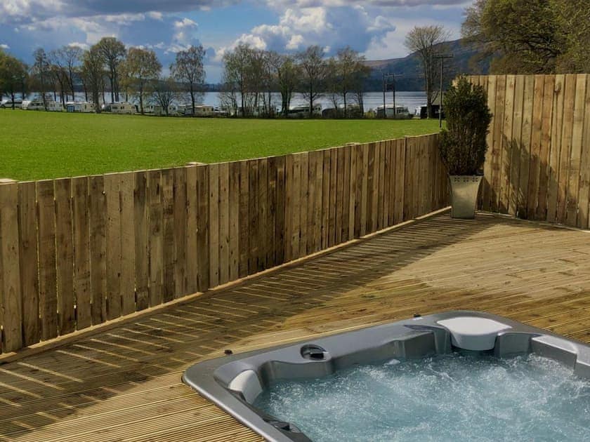 Views to the lake from the hot tub area | Clarinnes Cottage, Rowardennan