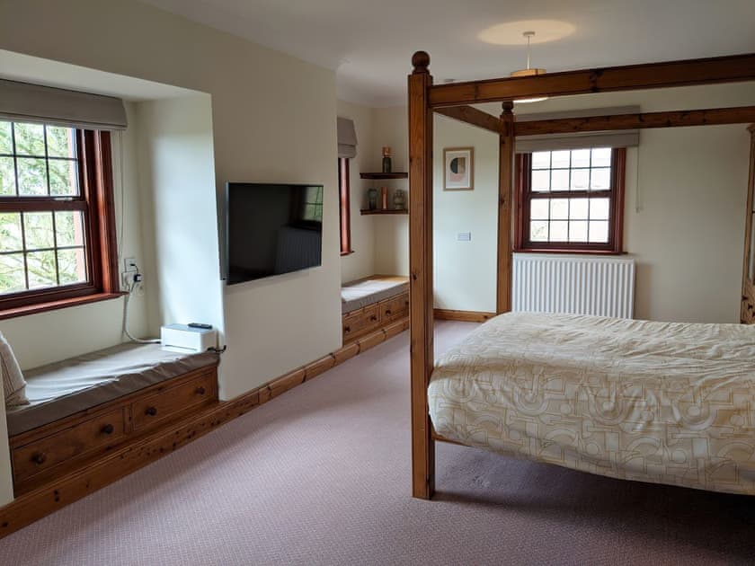 Window seats in the king bedroom | Brambleside, Mawbray near Allonby