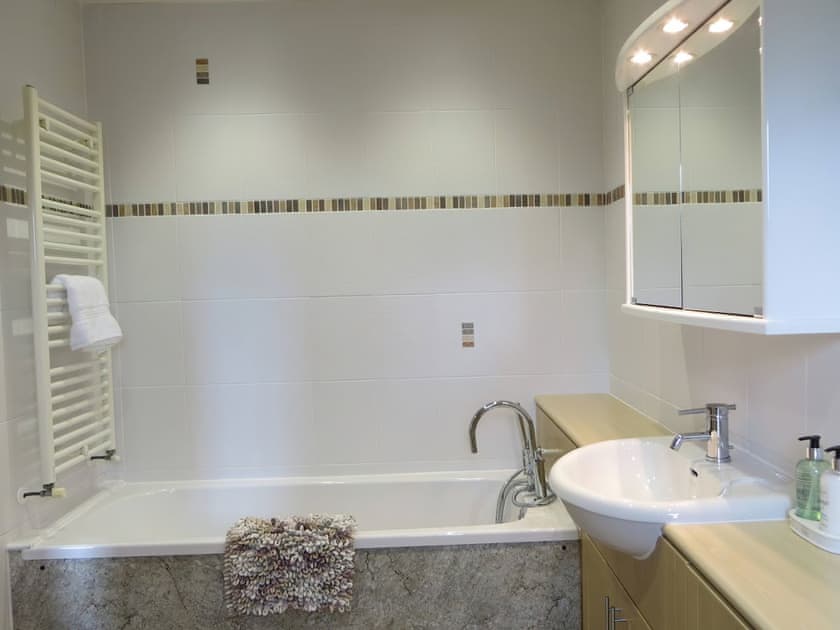 En-suite with bath and shower | Brambleside, Mawbray near Allonby
