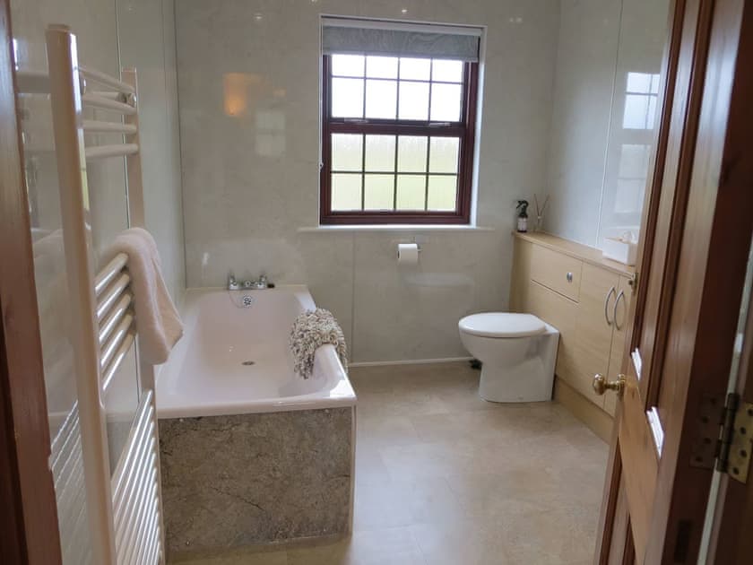 Main bathroom with bath and shower | Brambleside, Mawbray near Allonby