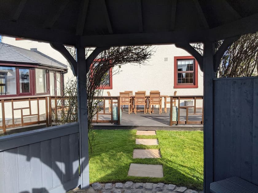Pathway through the gazebo | Brambleside, Mawbray near Allonby