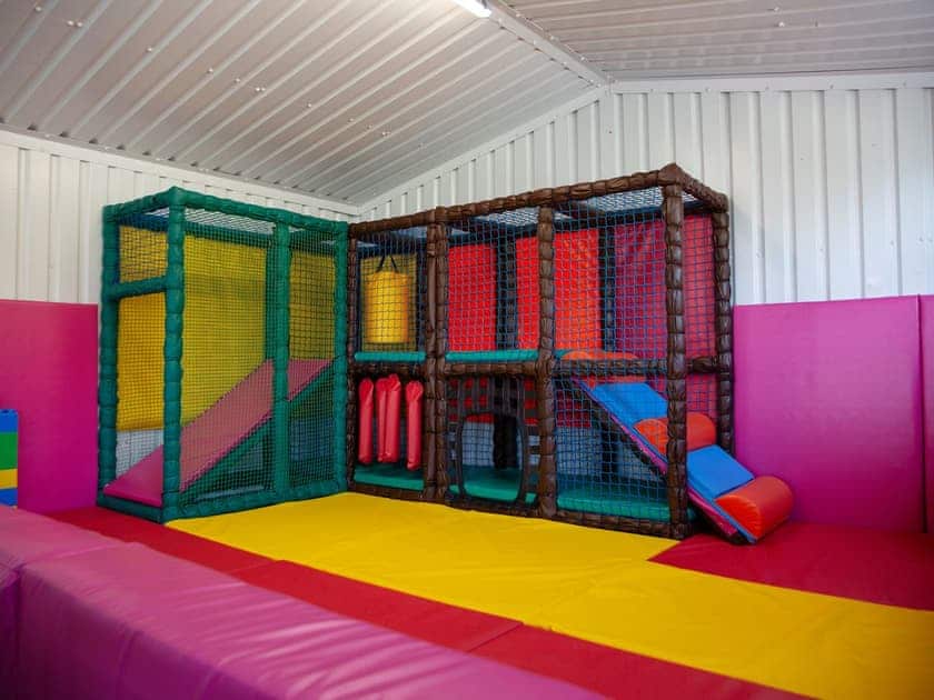 Children’s play area | The Coach House - Woodlands Manor Farm, Woodford, near Bude