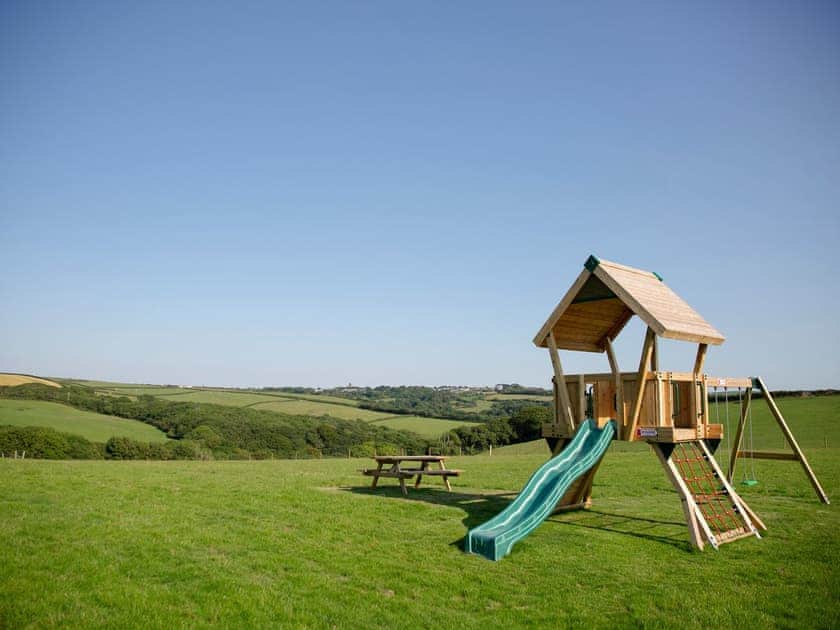 Children’s play area | The Coach House - Woodlands Manor Farm, Woodford, near Bude
