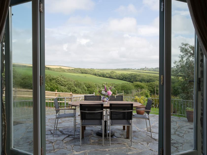 French doors from living area to patio | The Stables - Woodlands Manor Farm, Woodford, near Bude