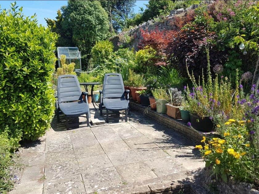 2 sunloungers on patio area | Galmpton Farm Close, Galmpton, near Brixham