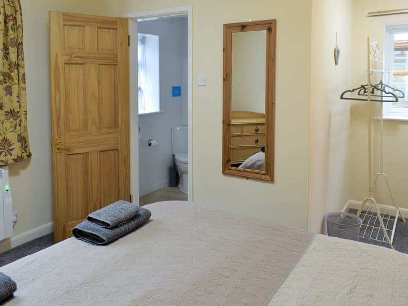 Master bedroom | The Coach House - Caernarfon Cottages, Bethel, near Snowdon