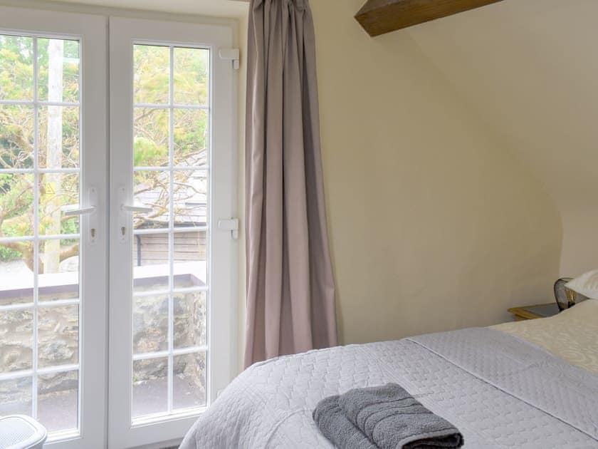 Family bedroom | The Coach House - Caernarfon Cottages, Bethel, near Snowdon